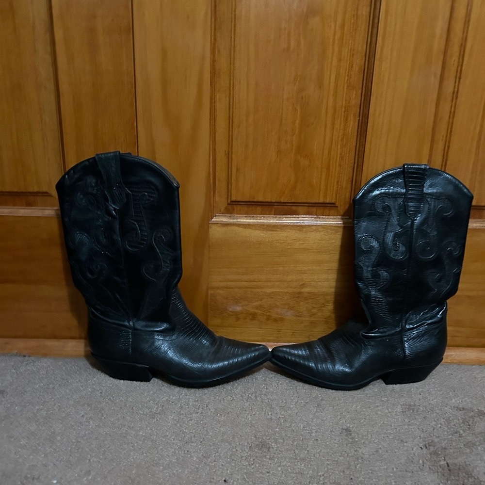 Black leather cowboy boots.